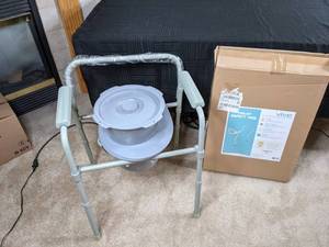 lot 55 image: Drive Medical Commode Chair with Accessories and Vive Toilet Safety Rail