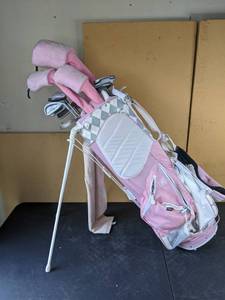 lot 11 image: Score Card Pink Golf Bag with Driver, Iron Clubs, Golf Balls and More