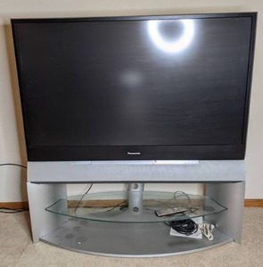 lot 254 image: Panasonic 60 Multimedia Projection HDTV with Attached Stand
