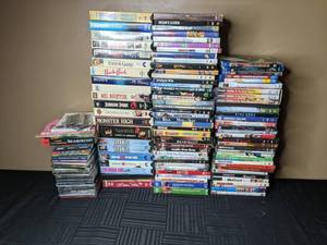 lot 237 image: 90 DVDs and VHS Cassettes, 4 Books, 2 Cassette Tapes, and 20 CDs & CD-ROMs (Seabiscuit, Sinatra, Whitney Houston, Harry Potter, Oceans Eleven, and more)