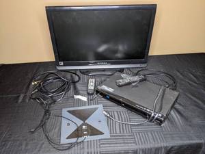 lot 238 image: Dynex 24 LED HDTV with Remote, ClearTV X-71 Digital Antenna, Magnavox Blu-Ray Player with Remote