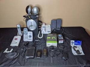 lot 246 image: Assorted Electronics - Cordless Phones, Motorola & LG Cell Phones, Casio Pocket TV, Kiddie Carbon Monoxide Detector, Chargers, Phone Accessories, etc.