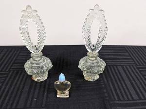 lot 141 image: Vintage Clear Crystal Perfume Bottles with Lids