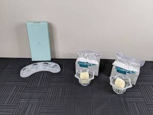 lot 148 image: PartyLite Votive Candle Set