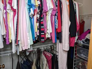 lot 123 image: Closet Full of Womens Clothing Sizes LXL and Wire Basket Organizers
