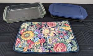 lot 129 image: Pyrex Glass Baking Dishes and Cook N Carry Cozy