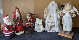 lot 194 image: Collection of Six Unique Santas Statues