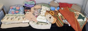 lot 185 image: An Assortment of Kitchen Towels including Norwex cloths, Oven Mitts and More