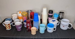 lot 282 image: Large Assortment of Drink Cups Mugs, Travel Mugs, Plastic Cups, Paper Cups, Water Bottles and More