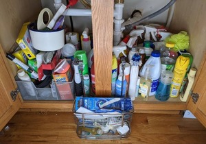 lot 283 image: Contents of Entire Cleaning Cabinet Cleaning Products, Cleaning Tools, Metal Basket, Hanging Cabinet Basket and More