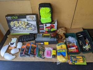 lot 223 image: Mixed Lot Halloween Ghost Decoration, Deviled Egg Chiller Tray, Auto Car Care Kit, 5 Emergency Ponchos, and More.