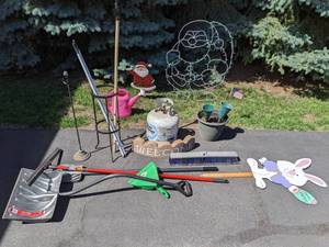 lot 225 image: Mixed Lot Easter Bunny Sign, Snow Shovel, Propane Tank, Squeegee, Santa Decor, Plant Stand and More