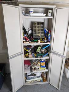 lot 208 image: Freestanding Plastic Storage Closet Plus Contents (Chrome & Glass Cleaners, Adhesives, Paint Supplies, and Much More)