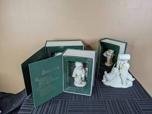 lot 158 image: (4) Department 56 Ceramic Figurines Winter Tales of the Snowbabies Collection - Two on a Sled and Christmas Stockings, Jingle Bells, Shall I Play For You, I Can Touch My Toes
