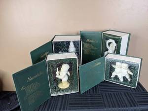 lot 159 image: (4) Department 56 Ceramic Figurines Winter Tales of the Snowbabies Collection - Climbing on Tree, A Star in the Box, Just One Little Candle, Best Friends