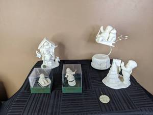 lot 16 image: Collection of Snowbabies Figurines Riding Sled Music Box, Friendship Club, Getting Mail and More