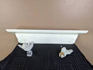 lot 31 image: Snowbabies Figurines and 24-Inch x 4.5-Inch Wall Shelf