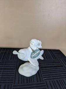 lot 29 image: Vintage Department 56 Snowbabies I Can Fly Figurine