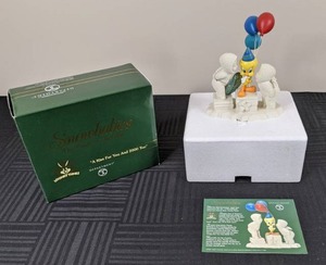 lot 75 image: Dept. 56 Snowbabies & Looney Tunes (Tweety) A Kiss For You and 2000 Too, 1999