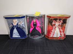 lot 279 image: NEW Vintage Mattel Happy Holidays 1997 Barbie, Happy Holidays 1998 Barbie and Special Millennium 1999 Barbie