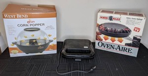 lot 219 image: Lot of 3 Small Appliances West Bend Stir Crazy Corn Popper, Nordic Ware Oven-Aire, and Sandwich Toaster