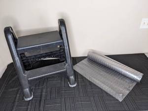 lot 301 image: Foldable Black Step Stool and Non-Slip Chair Mat