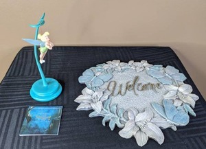lot 321 image: Tinker Bell 1996 Special Edition Ornament and Stand Classics Walt Disney Collection and Welcome Wall Hanging