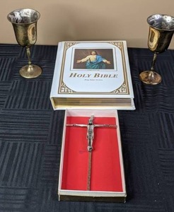 lot 326 image: King James Holy Bible, Pair of Silver Chalices, and Crucifixion Wall Hanging