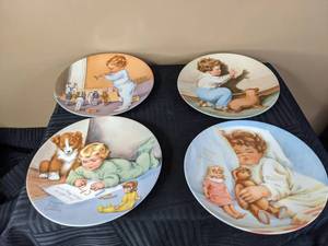 lot 315 image: Taps Fifth Issue #20, Oh Oh A Bunny First Issue #296, Looking for Trouble Fourth Issue #32, The New Friend Second Issue #719 By Bessie Pease Gutmann in Bessies Best Series From Curator Collection Decorative Plates