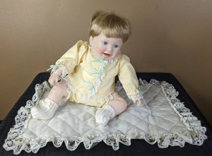 lot 317 image: Vintage Danbury Mint Playing Footsie Doll