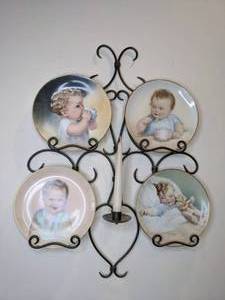 lot 80 image: Wrought Iron Plate Holder with 4-Plate Collection from Hamilton Bundles of Joy Series Tommy, Billy,  Happy Dreams and Tasting Besse Pease Gutmann
