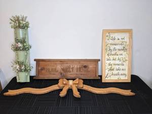lot 280 image: Collection of 4 Wall Art Pieces Wood Home Sweet Home Plaque, Wooden Bow, 3 Tiered Metal Floral Arrangement & Wood Framed Quote