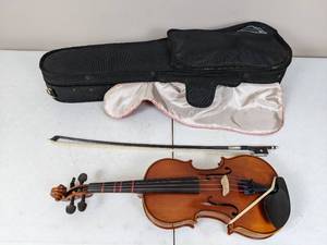lot 36 image: 18-Inch Small Wood Violin with a K. Holtz FG Violin Bow and Eastman Protg Shaped Violin Case