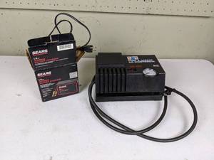 lot 117 image: Sears 1.5 Amp Manual Battery Charger and AC-Delco Home & Garage Air Compressor
