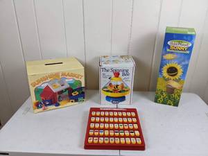 lot 86 image: Vintage Flip & Learn Alphabet, Sunshine Market, The Spinning Bee and Sunny The Singing Sunflower
