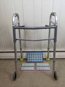 lot 92 image: Medline 300 lb. Adjustable Height Walker