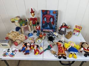 lot 111 image: Assortment of Vintage Toys Stuffed Goofy, Minnie, Spider-Man, Noise Makers, Pull Toys and More