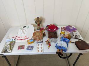 lot 119 image: Collection of Marionette Zertifikat, Souvenir from Iceland, Mini Doll Chair, Stickers, China Guang Zhou Hat, Panda Ornaments and More