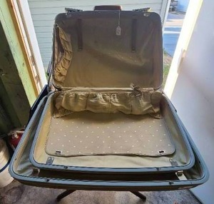 lot 29 image: Pair of Tan Hardside Suitcases