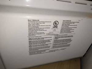 lot 113 image: GE Microwave Model P100K30ALS38