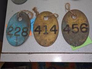 lot 478 image: 6 Vintage Brass Cow Tags