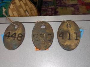 lot 473 image: Vintage Brass Cow Tags