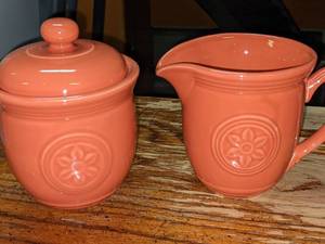 lot 371 image: Petite Purple Glass Pitcher and Coral Cream and Sugar Set