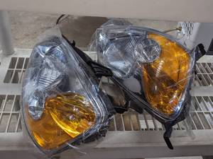lot 69 image: New PP TD-30 Right and Left Headlight Assembly, Honda Civic