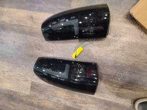 lot 74 image: 1999-2003 SilveradoSierra 1500 2500 HD LED ClearBlack Tail Lights Brake Lamps