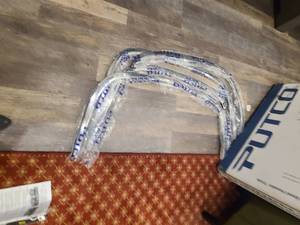 lot 94 image: Putco Stainless Steel Fender Trim Kits