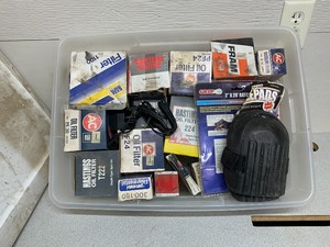 Tote full of new Car Parts