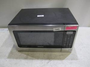 lot 545 image: Samsung MG11H2020CT 1.1 cu. ft. Countertop Microwave, 1000 Cooking Watts, Stainless Steel