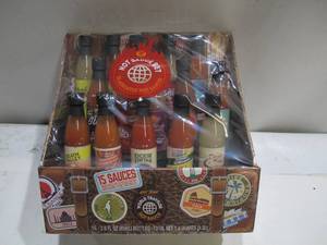 lot 666 image: World Traveler 15 Bottle Hot Sauce Set - NEW