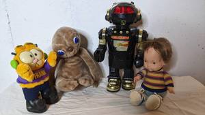 lot 55 image: Vintage 1970s and 80s Toys Robotron, ET, Garfield, and 1976 Fisher-Price Joey Doll ($200 Value)